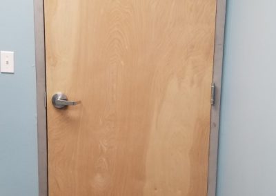 Commercial door with hollow metal jamb